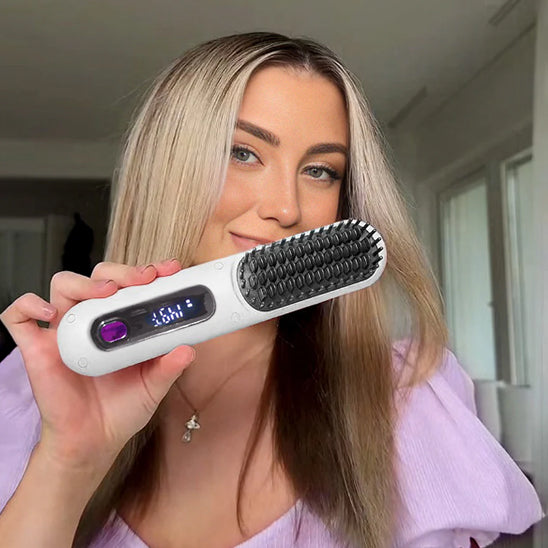 femme brosse chauffante lissante