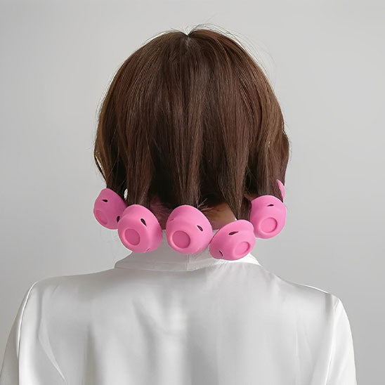 femme dos porte rouleau cheveux