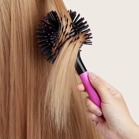 gros plan brosse coiffante ronde